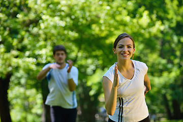 Image showing Young couple jogging at morning