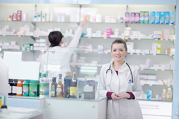 Image showing team of pharmacist chemist woman  in pharmacy drugstore