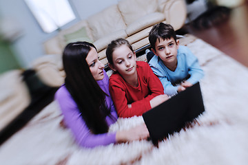 Image showing happy young family have fun at home