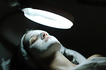 Image showing woman with facial mask in cosmetic studio