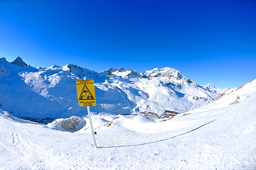 Image showing Sign board at High mountains under snow in the winter