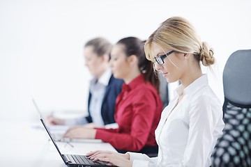 Image showing business woman group with headphones