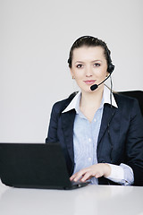 Image showing business woman group with headphones