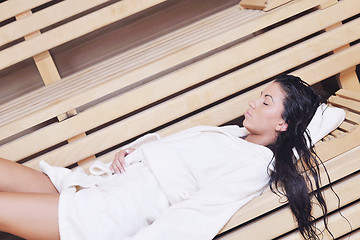 Image showing Young woman take a steam bath