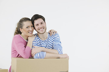 Image showing Young couple moving in new home