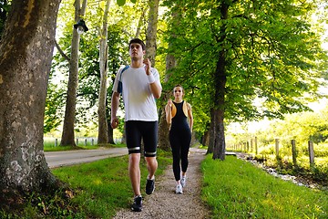 Image showing Young couple jogging