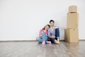 Image showing Young couple moving in new house