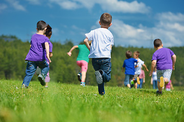 Image showing happy kids group  have fun in nature