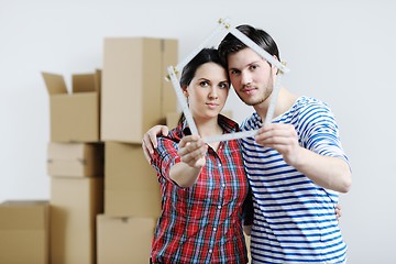 Image showing Young couple moving in new house