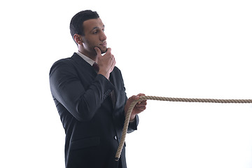 Image showing business man with rope isolated on white background