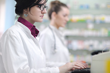 Image showing team of pharmacist chemist woman  in pharmacy drugstore