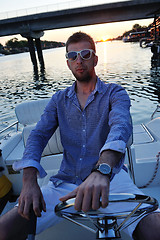 Image showing portrait of happy young man on boat