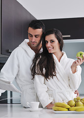 Image showing young couple have fun in modern kitchen