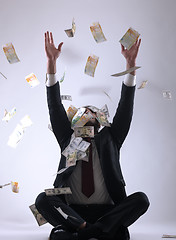 Image showing Business man holding money