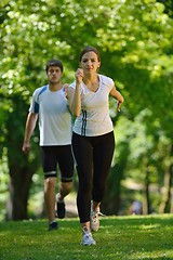 Image showing Young couple jogging