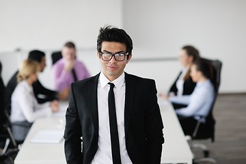 Image showing young business man at meeting