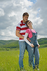 Image showing Portrait of romantic young couple smiling together outdoor