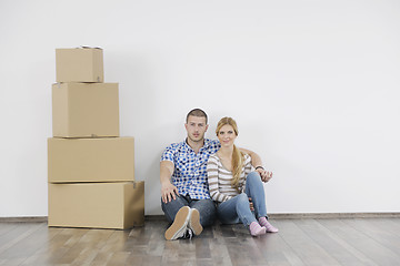 Image showing Young couple moving in new home