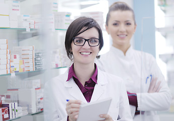 Image showing team of pharmacist chemist woman  in pharmacy drugstore