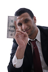 Image showing Business man holding money