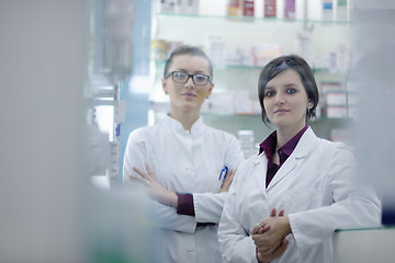 Image showing team of pharmacist chemist woman  in pharmacy drugstore