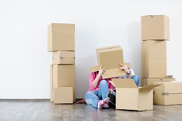 Image showing Young couple moving in new house