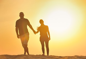 Image showing couple enjoying the sunset