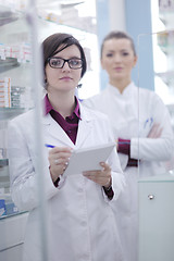 Image showing team of pharmacist chemist woman  in pharmacy drugstore