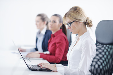 Image showing business woman group with headphones