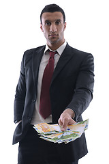 Image showing Business man holding money