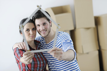Image showing Young couple moving in new home