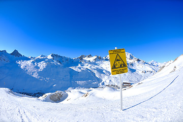 Image showing Sign board at High mountains under snow in the winter