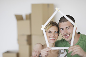 Image showing Young couple moving in new home