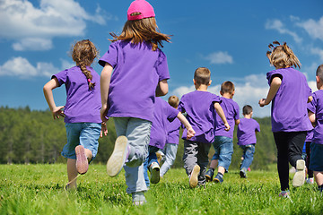 Image showing happy kids group  have fun in nature