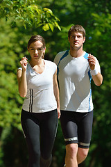 Image showing Young couple jogging at morning