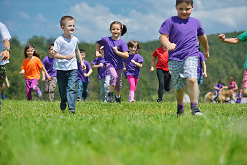 Image showing happy kids group  have fun in nature