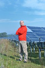 Image showing Male solar panel engineer at work place