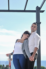 Image showing couple relaxing on balcony