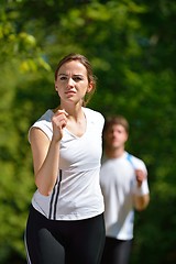 Image showing Young couple jogging at morning