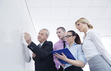 Image showing Senior business man giving a presentation