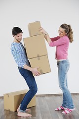 Image showing Young couple moving in new house