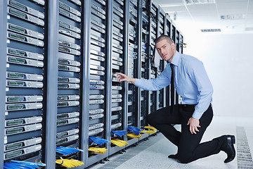 Image showing young it engineer in datacenter server room