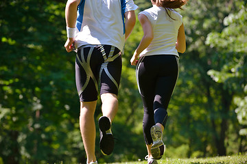 Image showing Young couple jogging