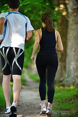 Image showing Young couple jogging