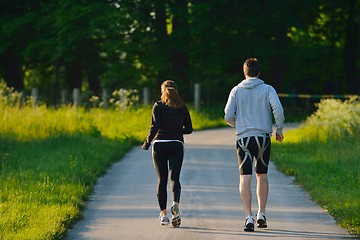 Image showing Young couple jogging