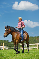 Image showing happy woman  on  horse