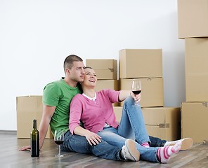 Image showing Young couple moving in new house