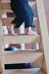 Image showing beautiful young child making first steps