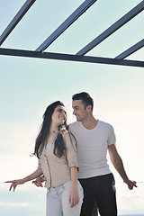 Image showing couple relaxing on balcony