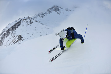 Image showing skiing on fresh snow at winter season at beautiful sunny day